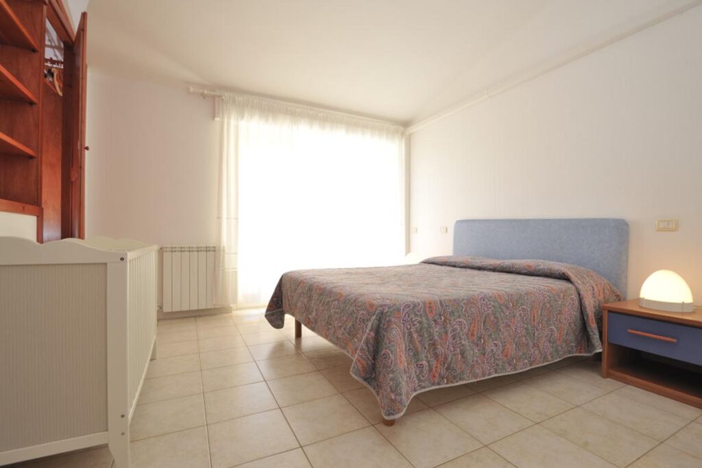 das Schlafzimmer der Ferienwohnung Le Terrazze Bilo - meer sardinien urlaub