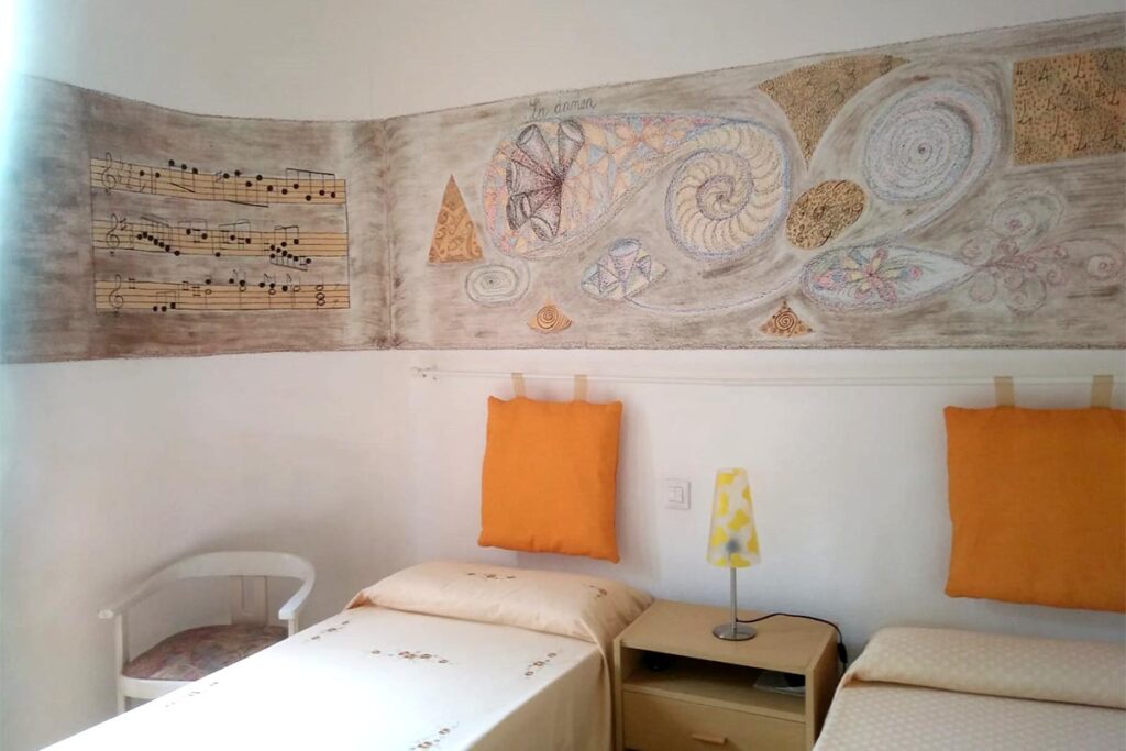 ein Doppelschlafzimmer des Ferienhauses Mandara - meer sardinien urlaub