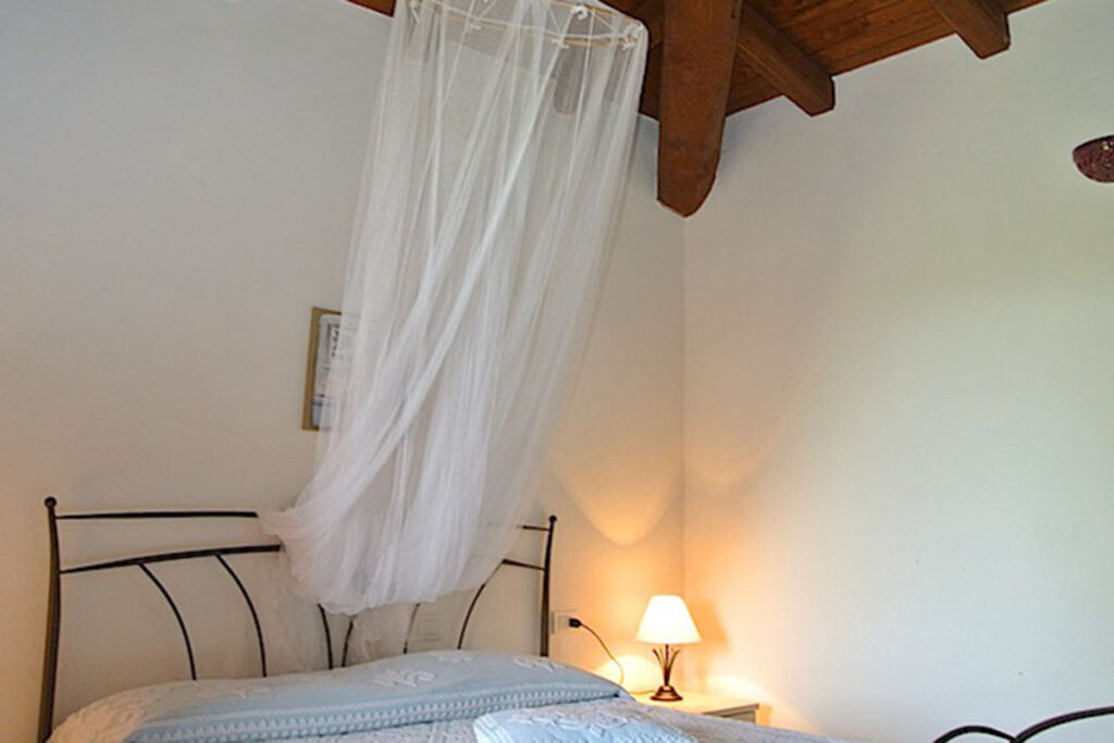 ein Schlafzimmer des Ferienhauses Bouganvillea, Capo Coda Cavallo bei San Teodoro - meer sardinien urlaub