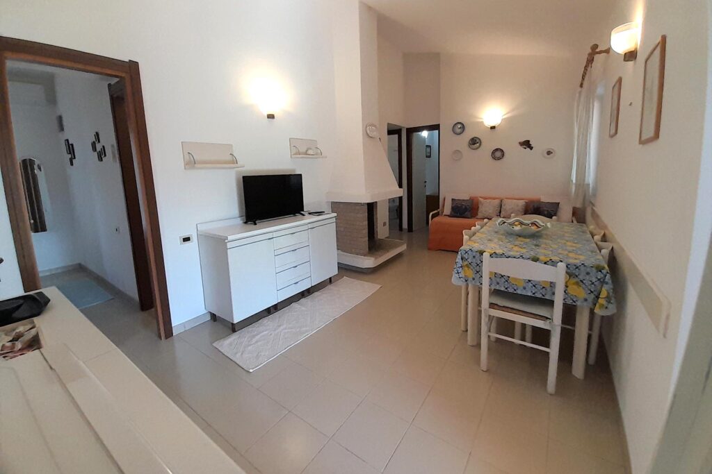 das Wohn- und Esszimmer des Ferienhauses Vivi, Costa Rei - meer sardinien urlaub