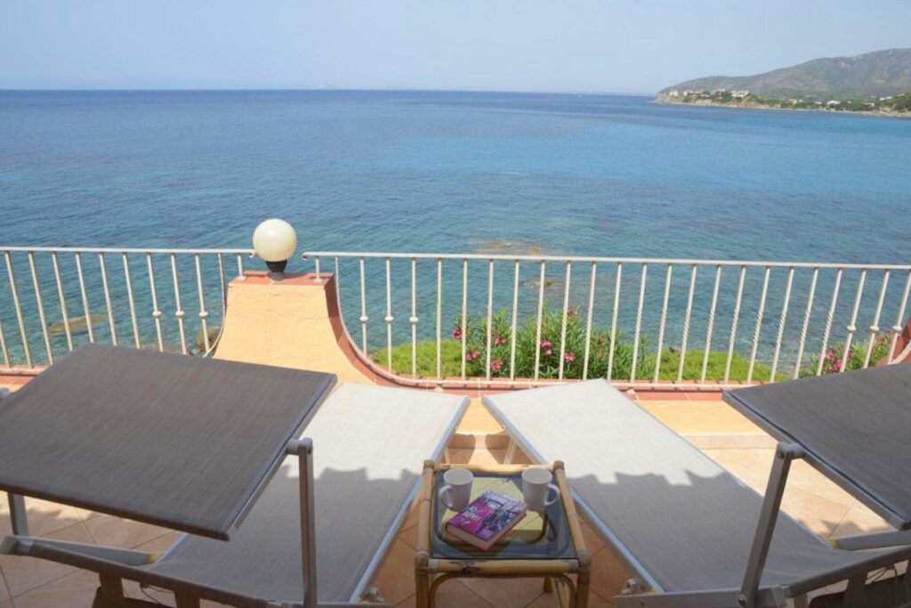 Entspannen auf der Terrasse mit Meerblick, Ferienhaus Barbara, Torre delle Stelle - meer sardinien urlaub