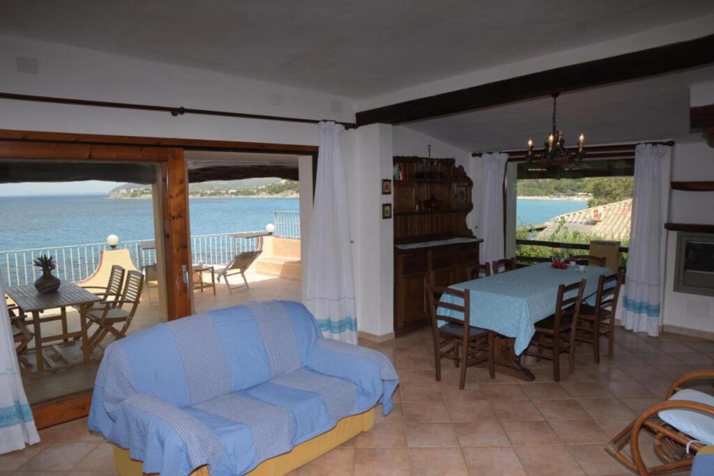 Wohnzimmer mit Meerblick, Ferienhaus Barbara, Torre delle Stelle - meer sardinien urlaub