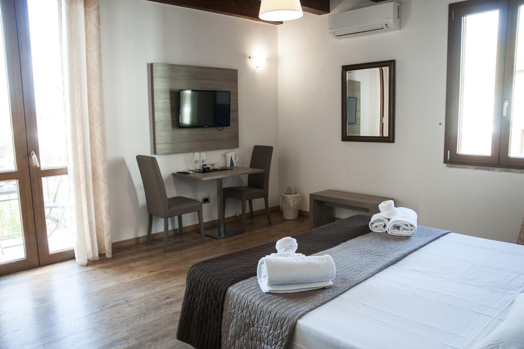 Das Deluxe-Zimmer 202, Hotel Maison de Charme Bienestar, Alghero - meer sardinien urlaub