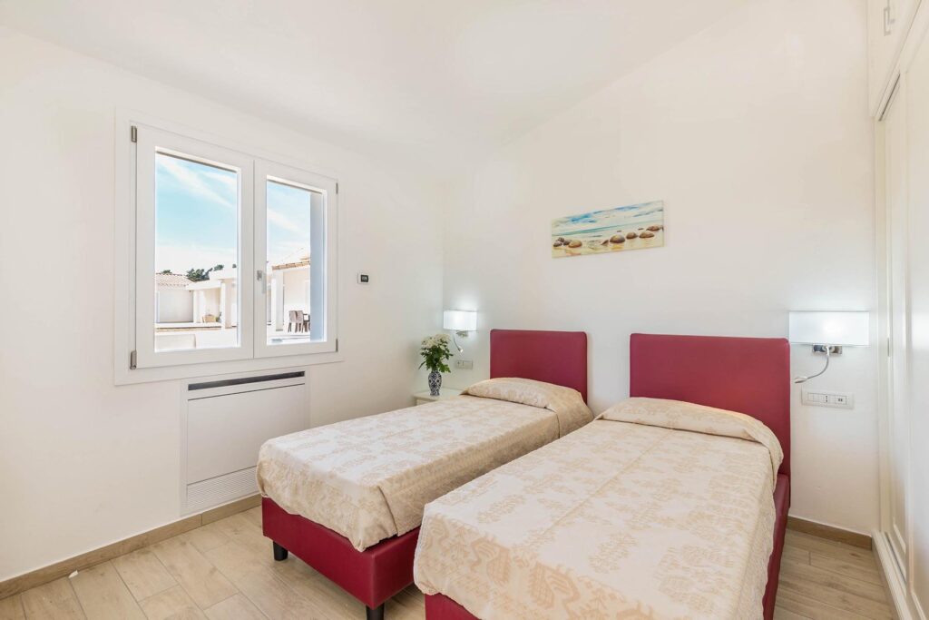 Das Doppelschlafzimmer der Ferienhäuser eines Ferienhauses Ville d´Ogliastra 1, Cardedu - meer sardinien urlaub