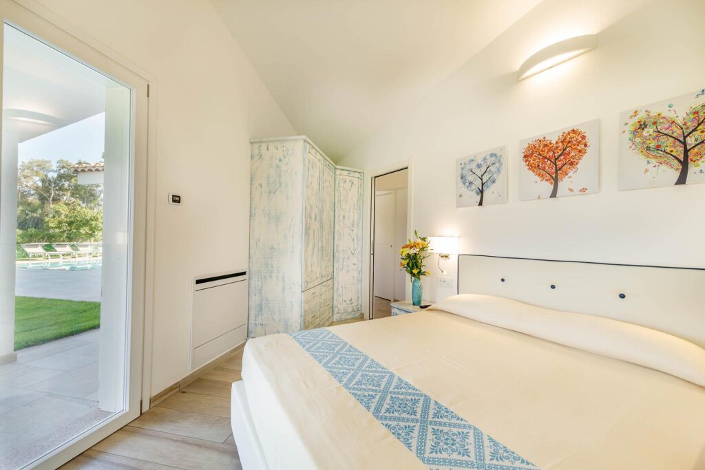 eines der zwei Doppelschlafzimmer eines Ferienhauses Ville d´Ogliastra 1 Piscina, Cardedu - meer sardinien urlaub