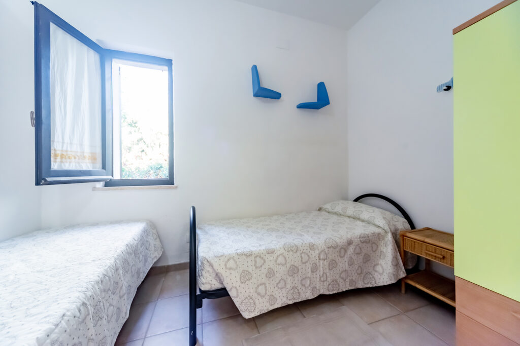 das Schlafzimmer mit zwei Einzelbetten, Ferienhaus Federica, Costa Rei - meer sardinien urlaub