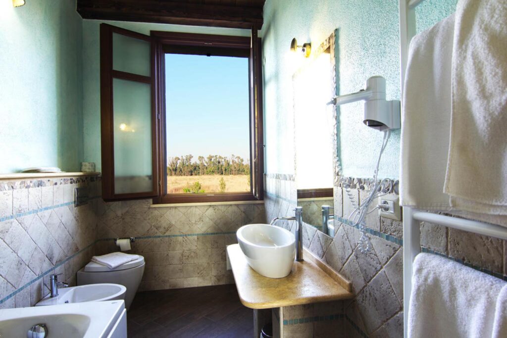 ein Badezimmer im Agriturismo Su Passu, Alghero - meer sardinien urlaub